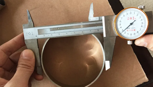 Sanitary valve dimensional inspection: a stainless steel tube measured with a caliper at Joneng