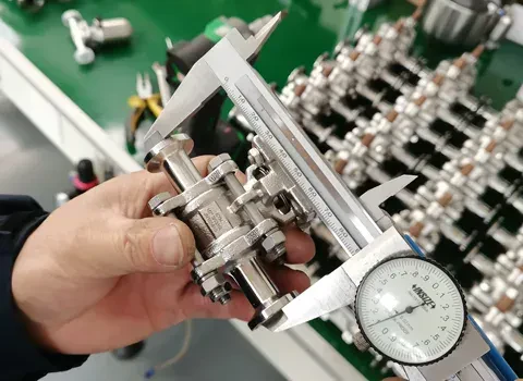 A mixproof valve measured with a dial caliper at Joneng