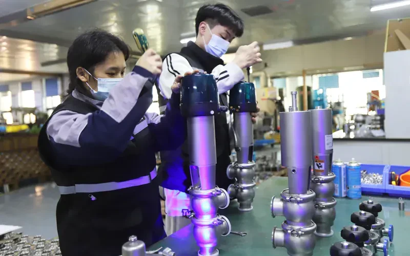 Sanitary valves being assembled and inspected at Joneng