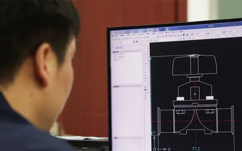 An engineer drawing a valve in CAD in Joneng’s R&D department